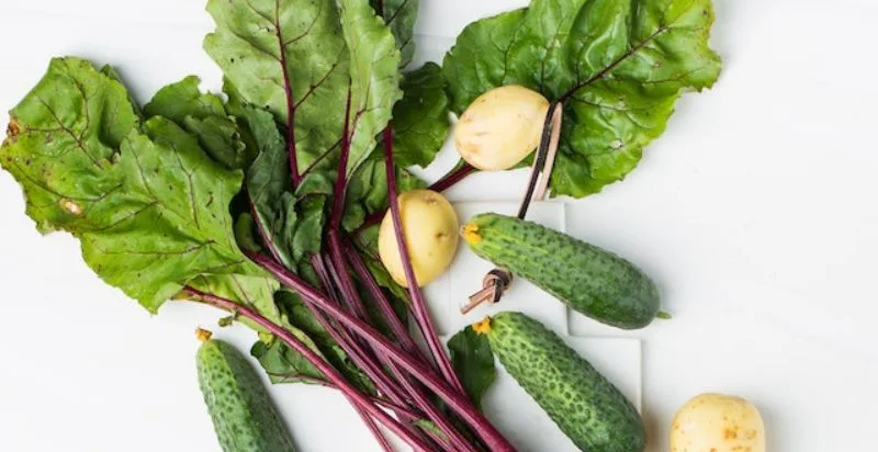 Mushrooms arranged with vegetables showcase their culinary versatility, enhancing flavor and texture.